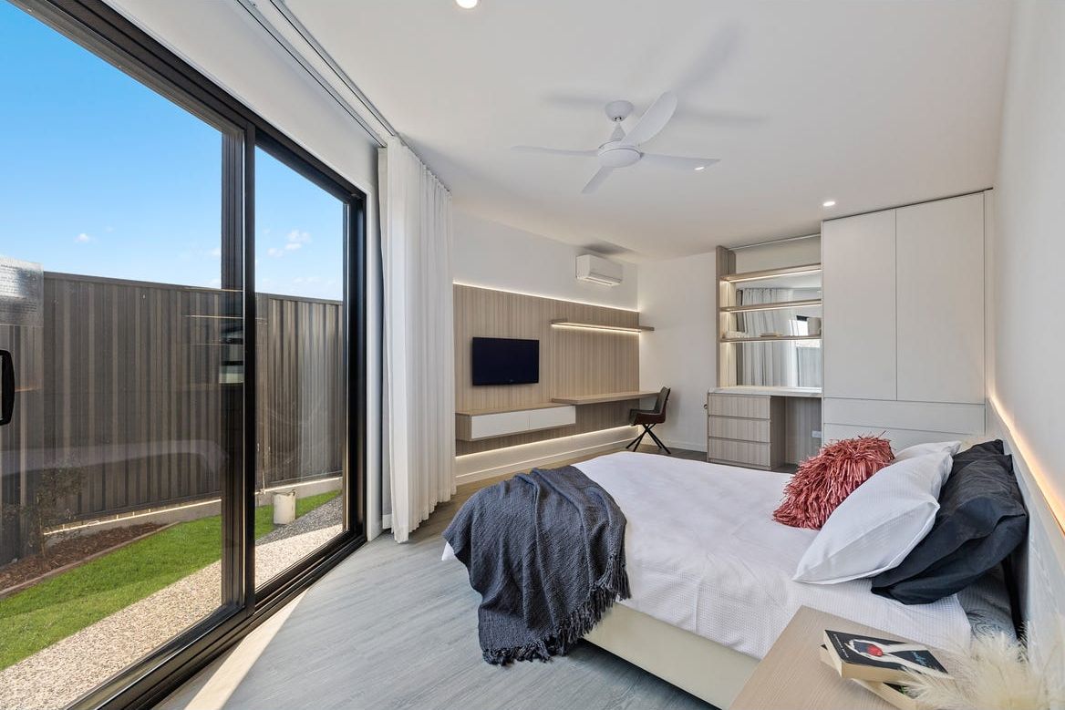 Harmony suite with a sliding door opening to a private courtyard garden